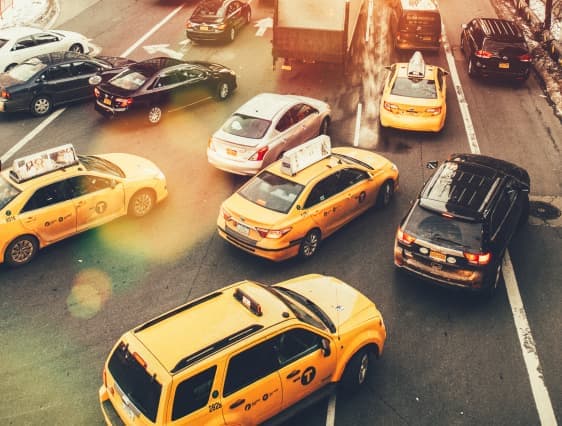 Taxis in traffic in a city